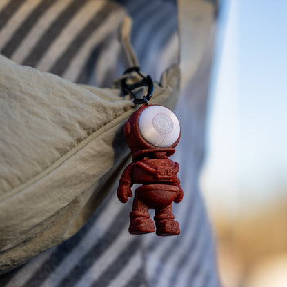 Rocket Rider: Astronaut Keychain with a Cosmic Rocket Capsule