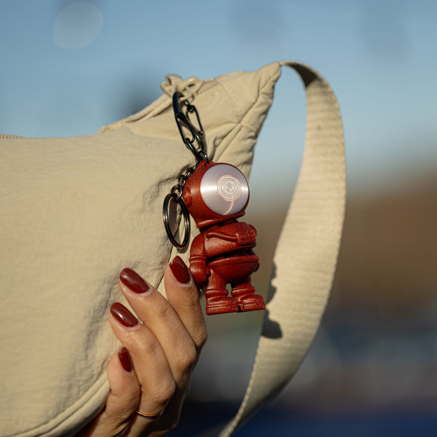 Rocket Rider: Astronaut Keychain with a Cosmic Rocket Capsule